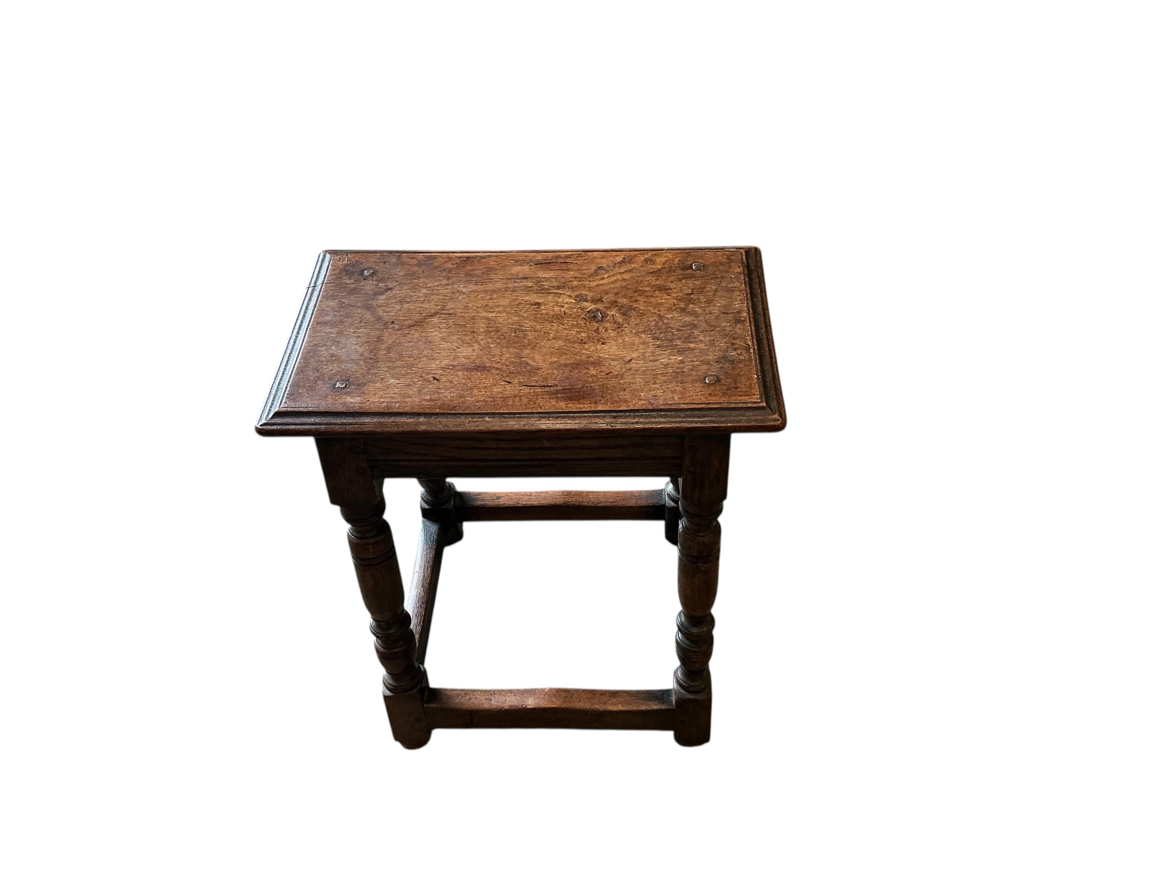 A 17th century style oak joint stool, width 46cm, depth 26cm, height 52cm